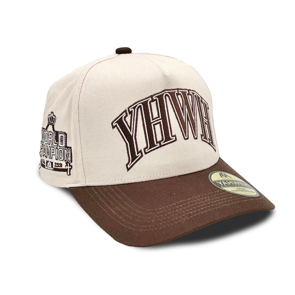 Cream and brown snapback cap with YHWH front logo and curved brim