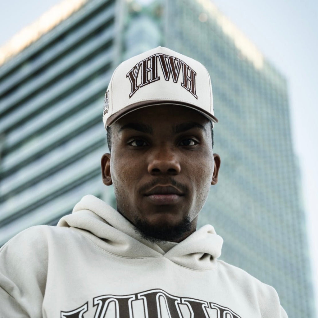 Cream snapback cap with YHWH front logo
