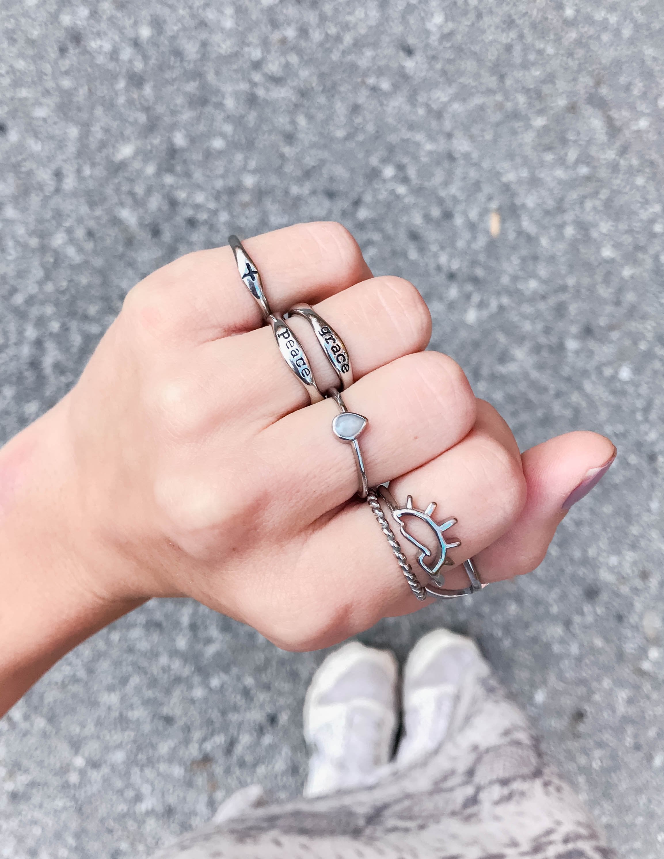 Silver promise ring with 'Promise' lettering and cross enamel