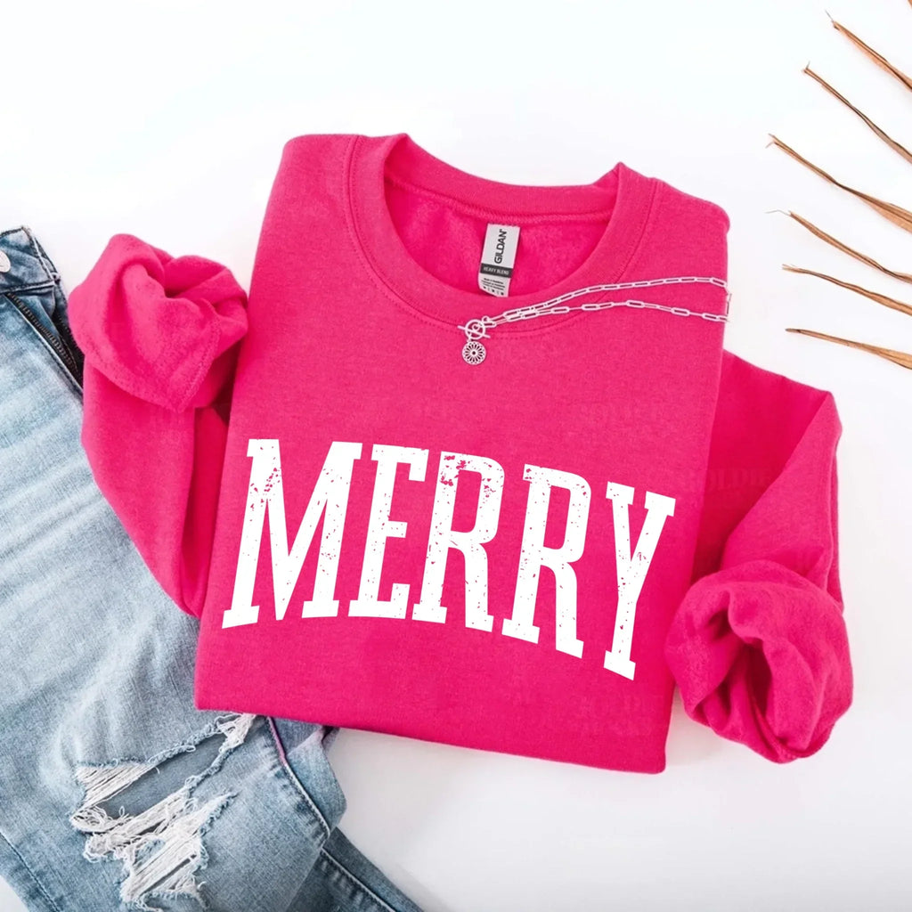 Women’s holiday sweatshirt in fuchsia with “MERRY” front graphic and crewneck button placket