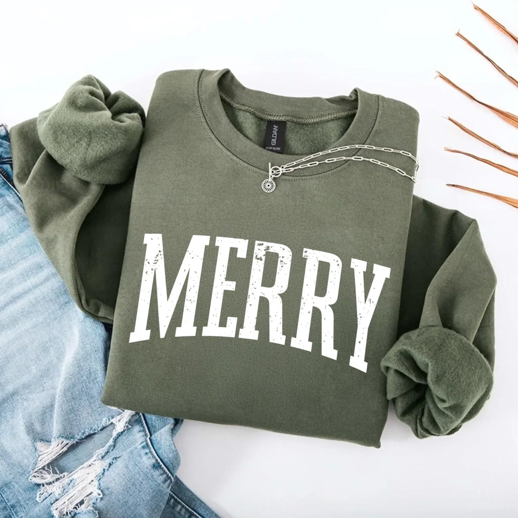 Women’s holiday sweatshirt in olive green with “MERRY” front graphic and crewneck buttons