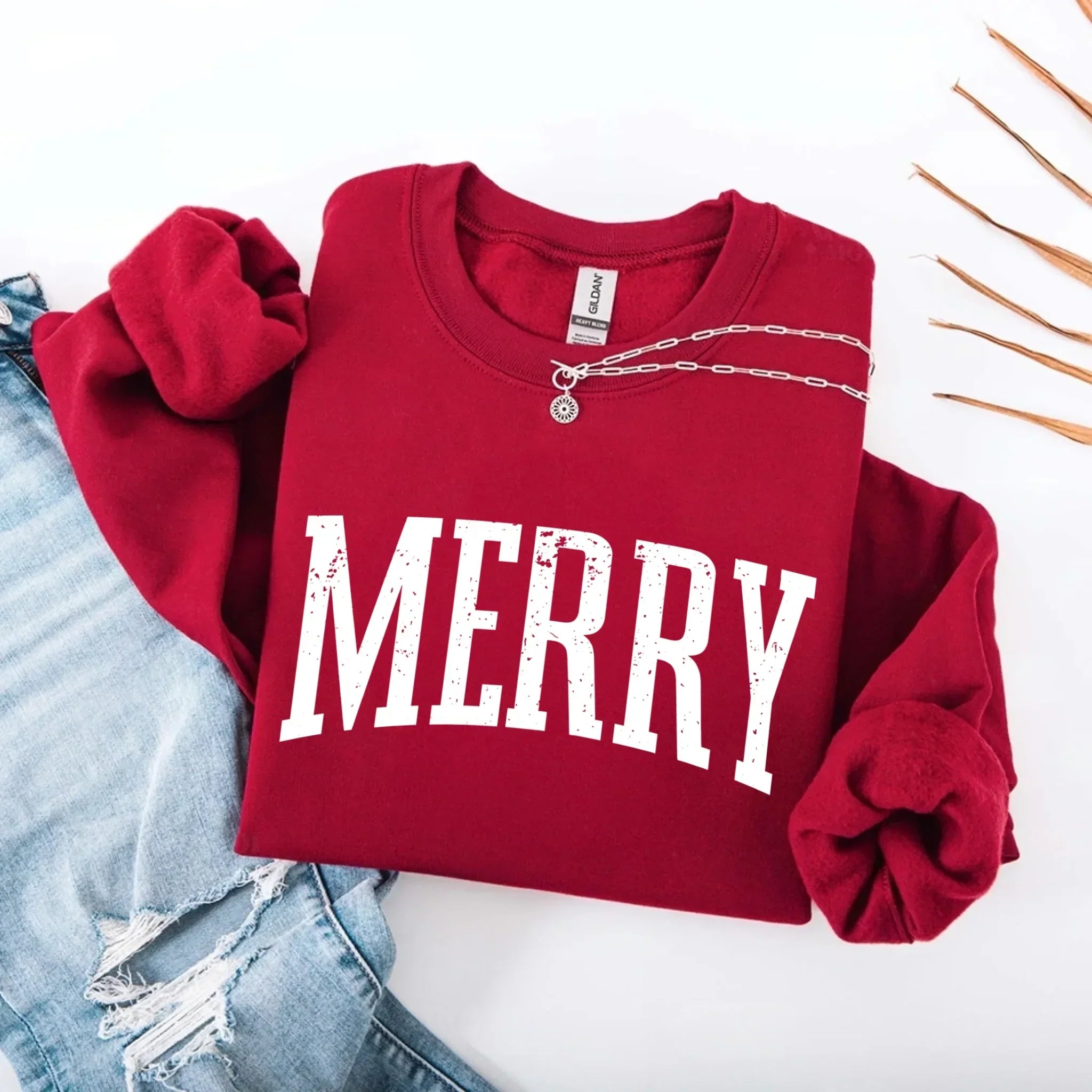 Women’s holiday sweatshirt, red, "MERRY" print with chain charm detail