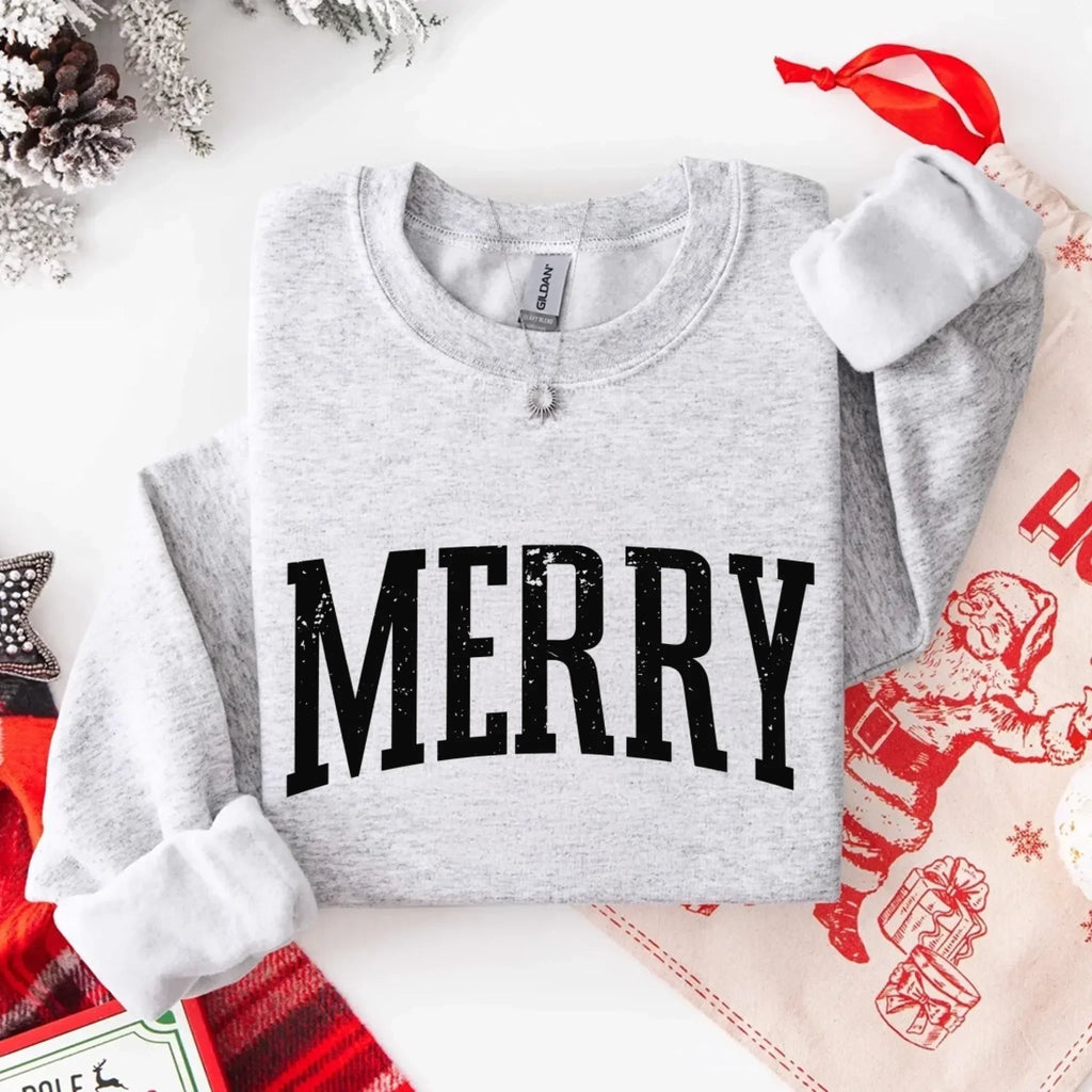 Women’s holiday sweatshirt in heather gray with “MERRY” front graphic and crewneck buttons