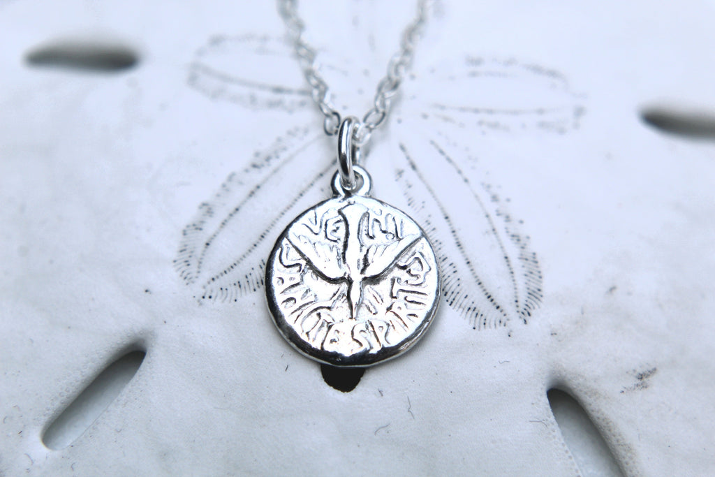 Sterling silver Holy Spirit medallion pendant with detailed design on chain