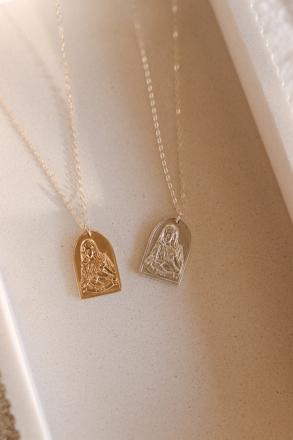 Sterling silver Saint Catherine charm pendants on two fine chains