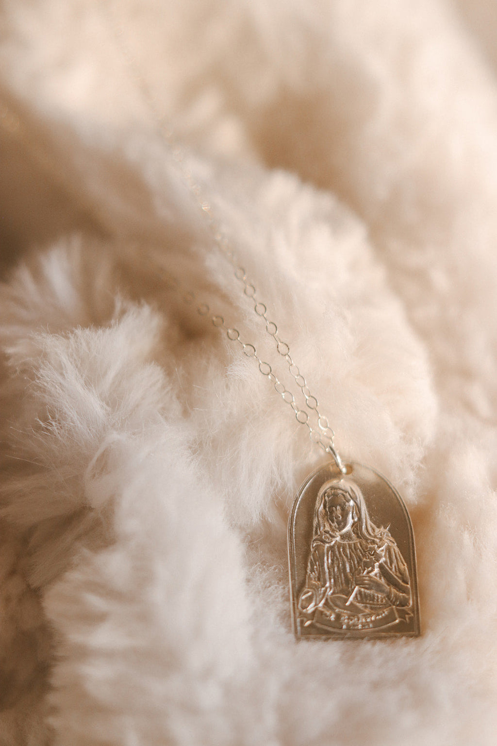 Sterling silver necklace with saint medallion heart pendant and fine chain