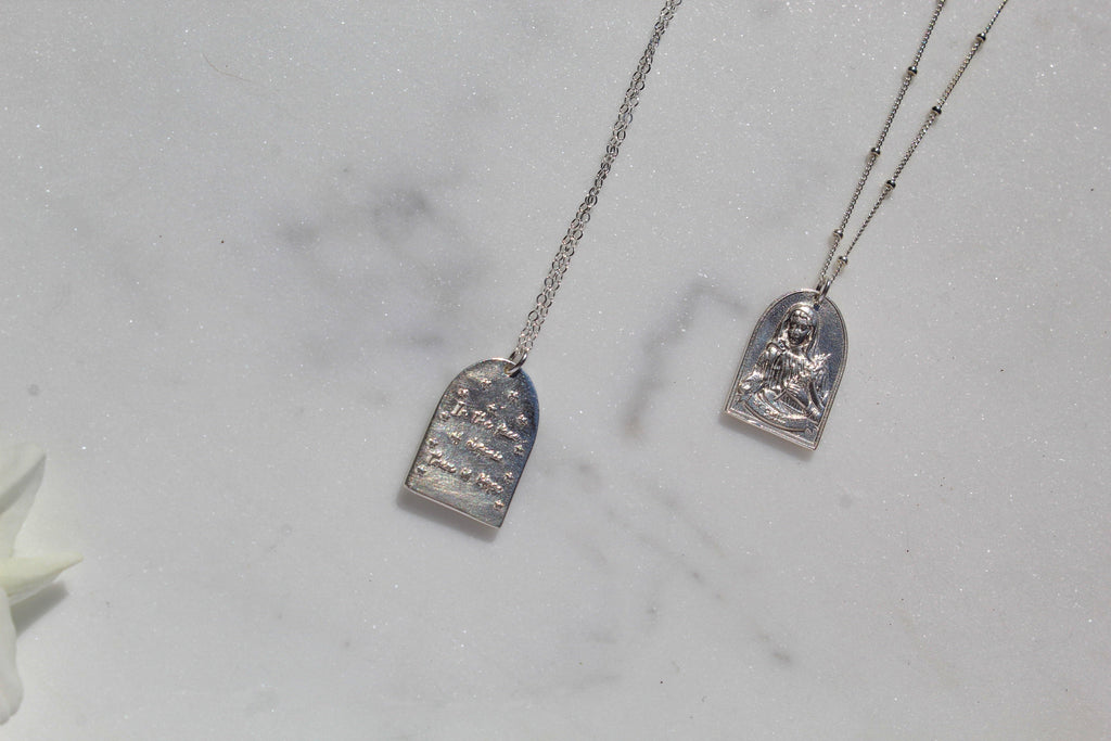 Sterling silver Saint Catherine pendant necklace set with two teardrop charm pendants