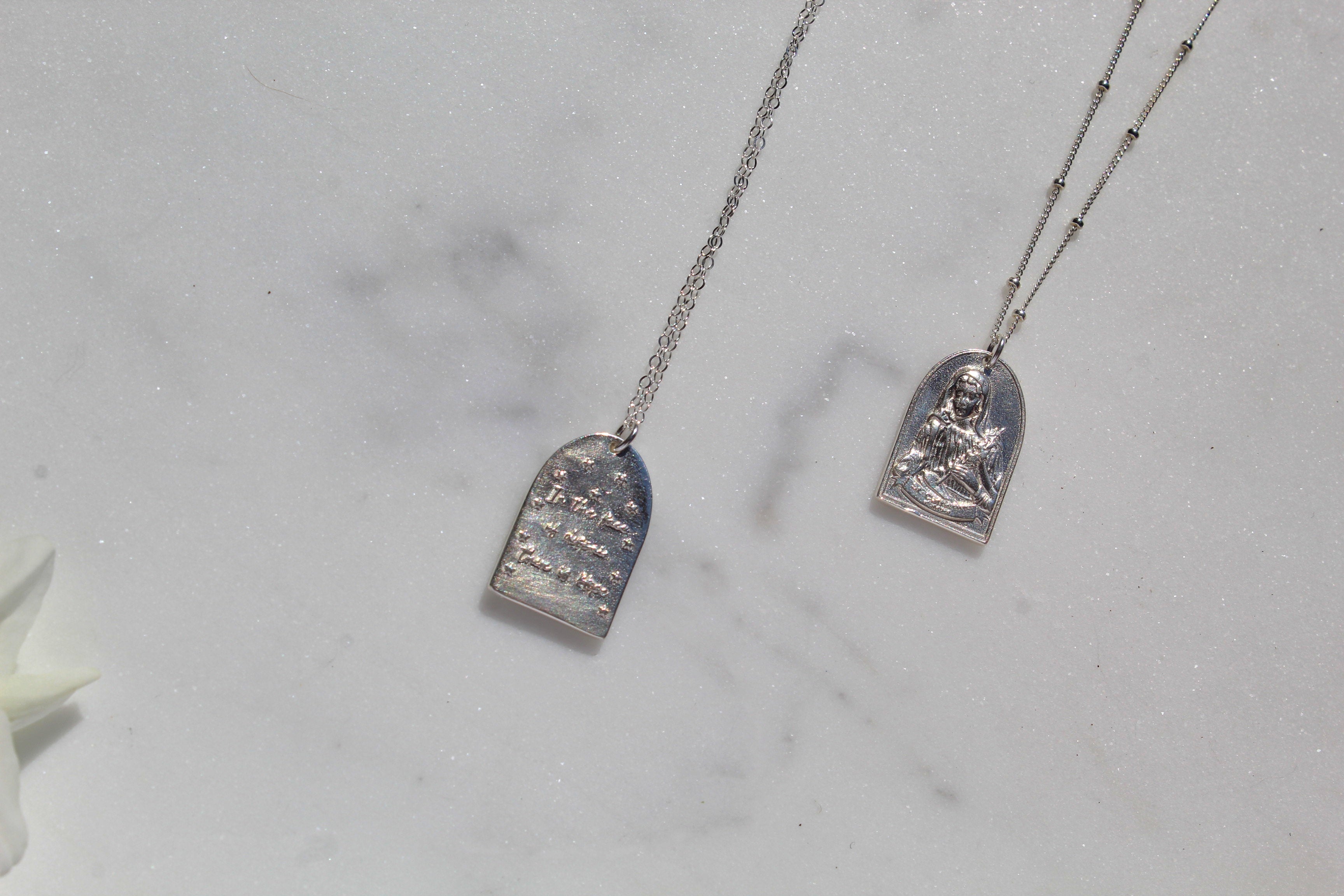 Sterling silver Saint Catherine pendant necklace set with two teardrop charm pendants