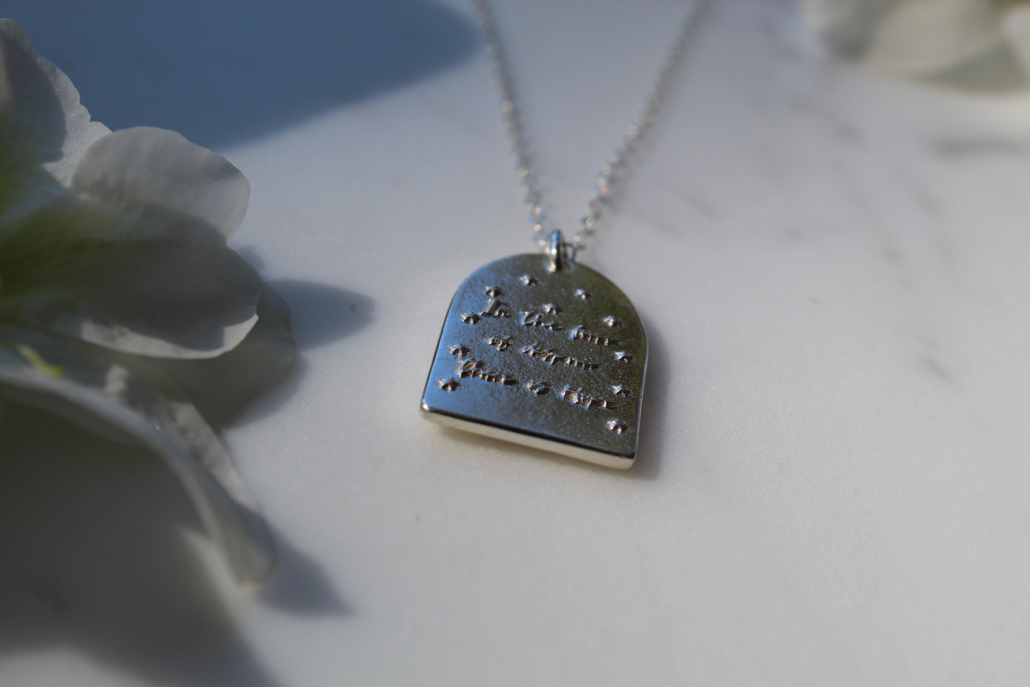 Sterling silver necklace with blue enamel heart pendant and fine chain