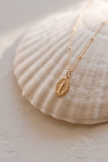 Gold-tone necklace with oval miraculous medal pendant on a fine chain