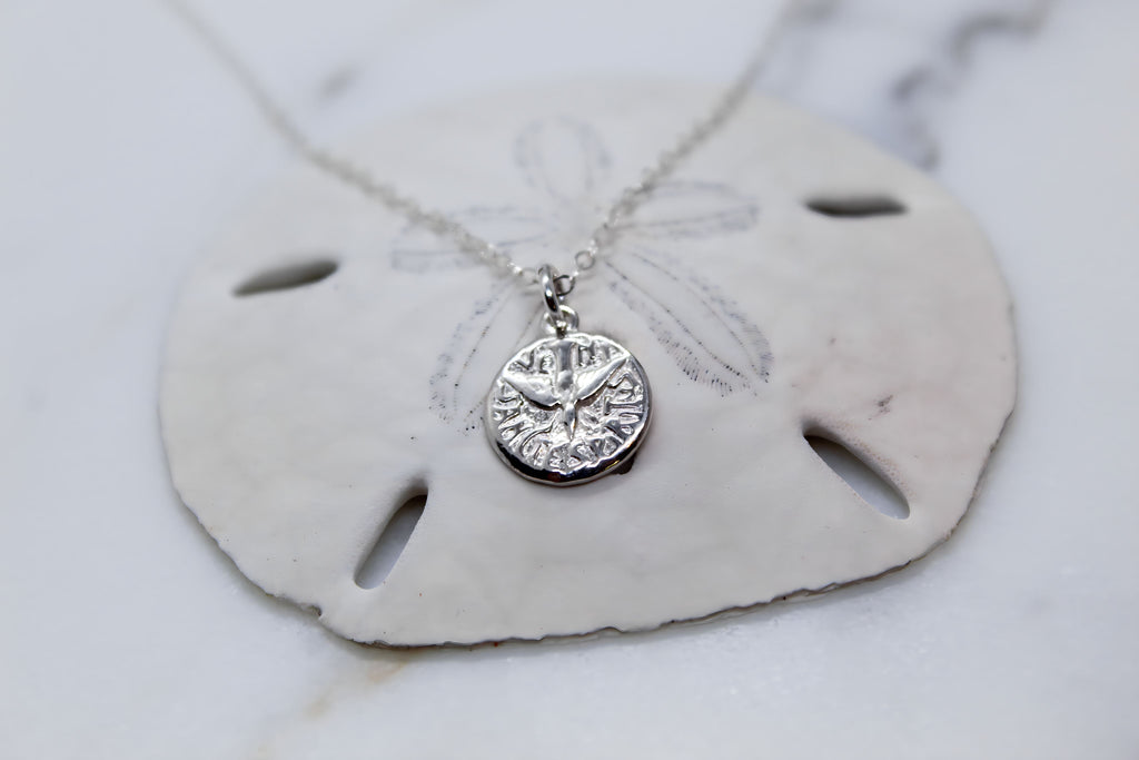 Sterling silver round Holy Spirit pendant with bird motif on chain