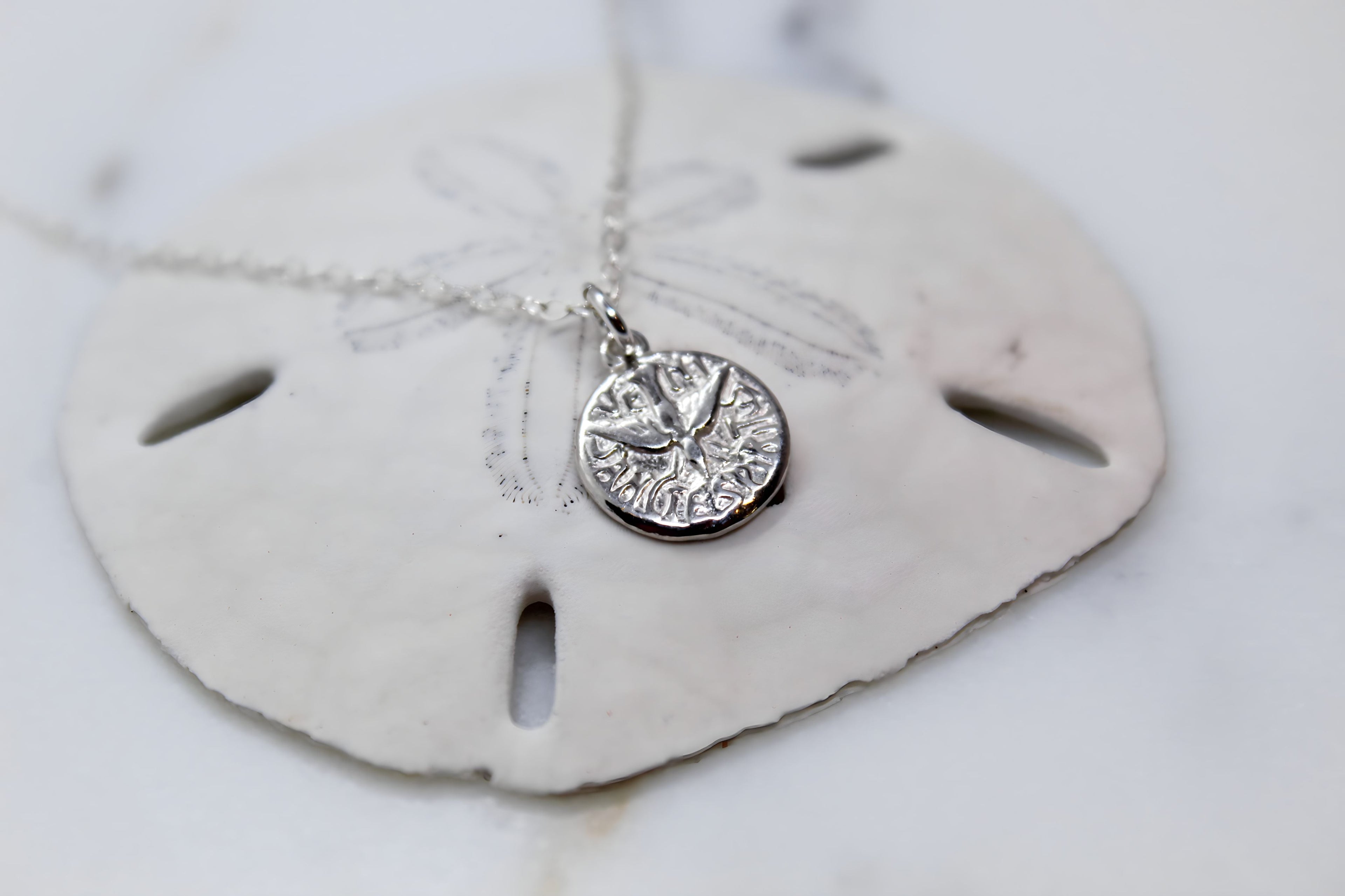 Sterling silver round Holy Spirit pendant with bird detail on chain