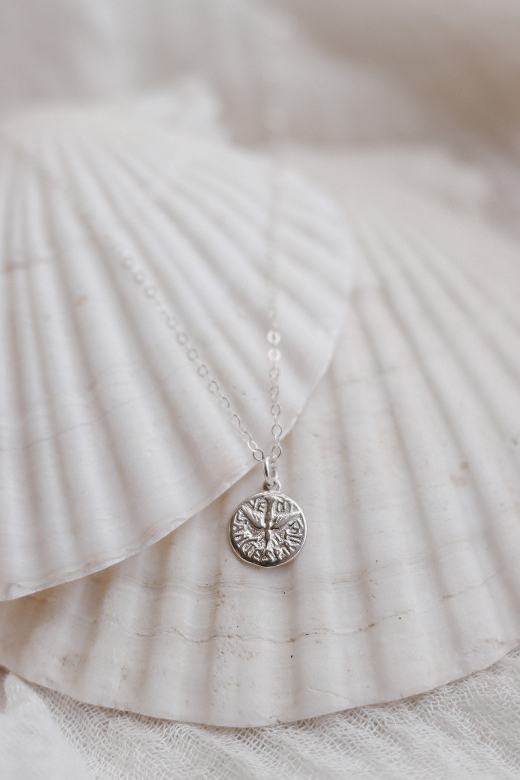 Sterling silver necklace with round Holy Spirit pendant and delicate chain