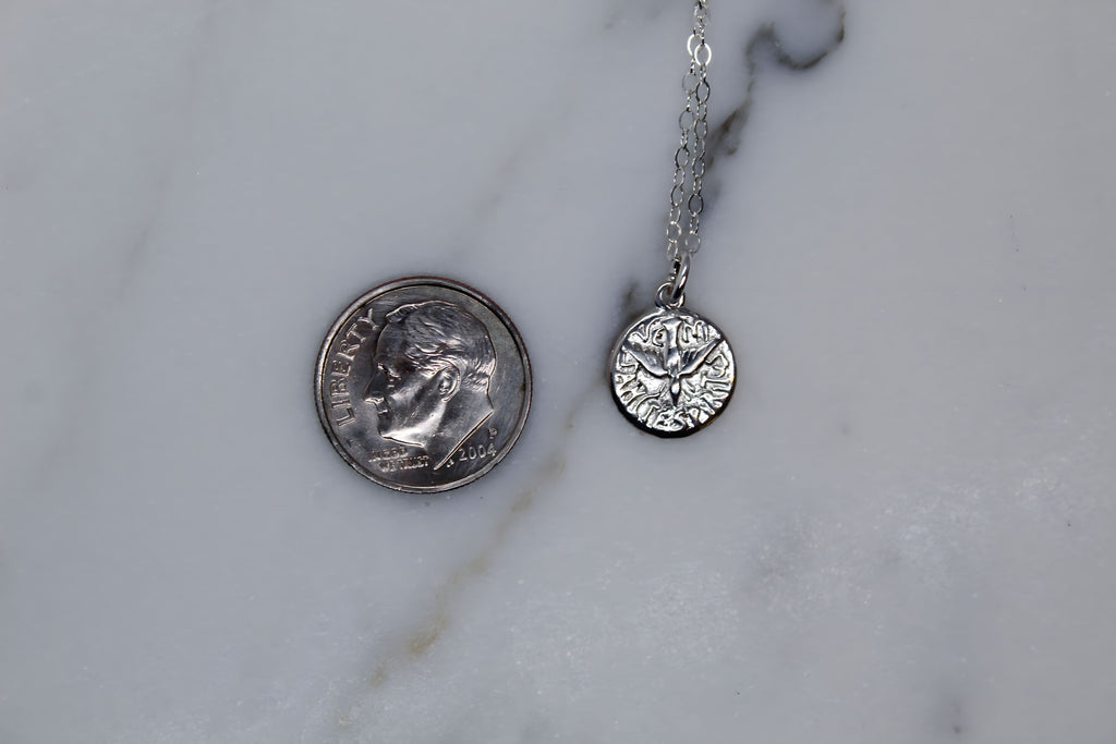 Sterling silver necklace with round Holy Spirit pendant on thin chain