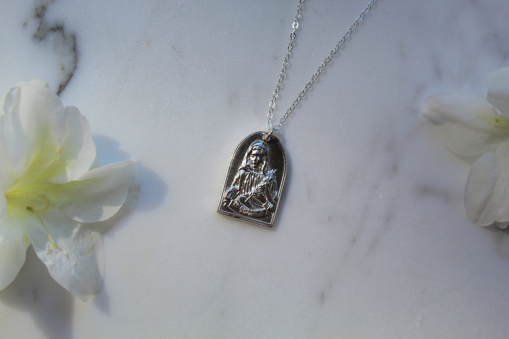 Sterling silver Saint Catherine pendant necklace with arched saint relief charm
