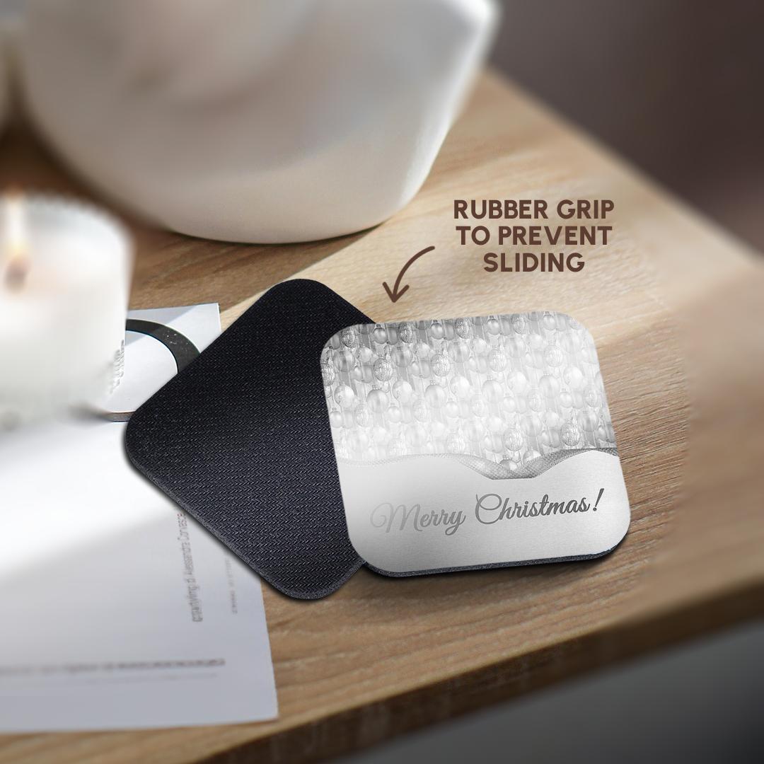 Coasters with rubber grip base; Merry Christmas script on silver ornament design