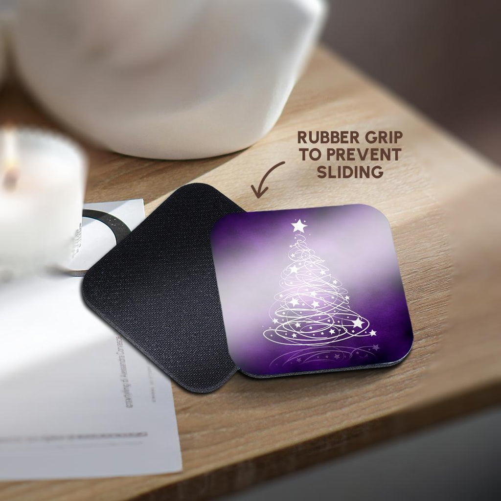 Dark purple coaster with white sparkling Christmas tree illustration