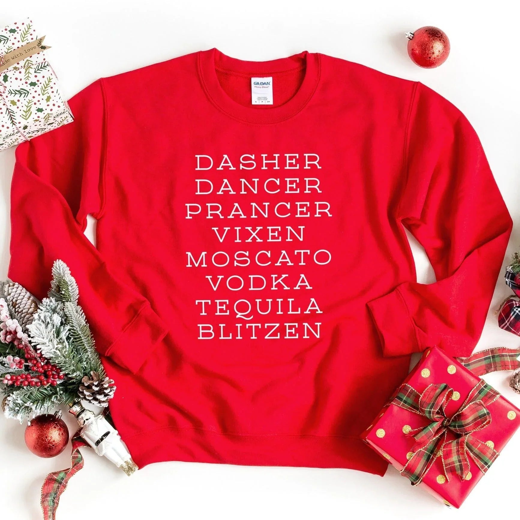 Red crewneck sweatshirt with reindeer names print: Dasher, Dancer, Prancer, Vixen, Moscat0, Vodka