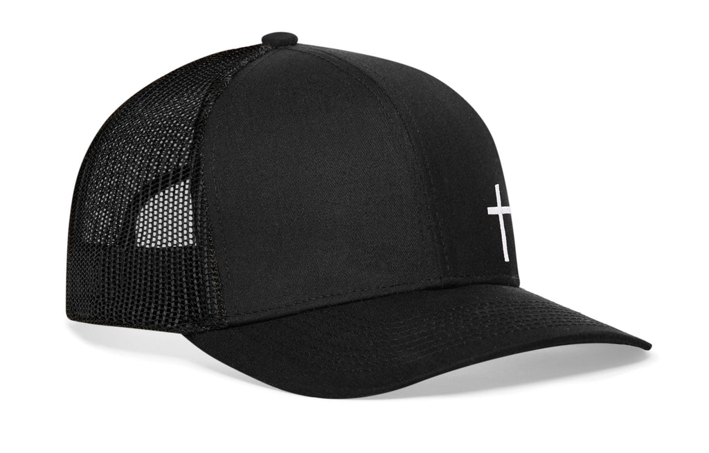 Black trucker snapback cap with white cross embroidery, mesh sides, snapback.