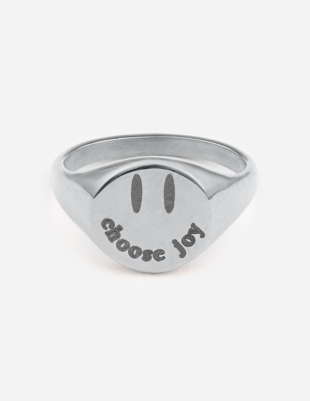 Silver band ring with 'Choose Joy' engraving on the round face.