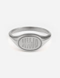 Silver signet ring with oval WWJD engraving on top