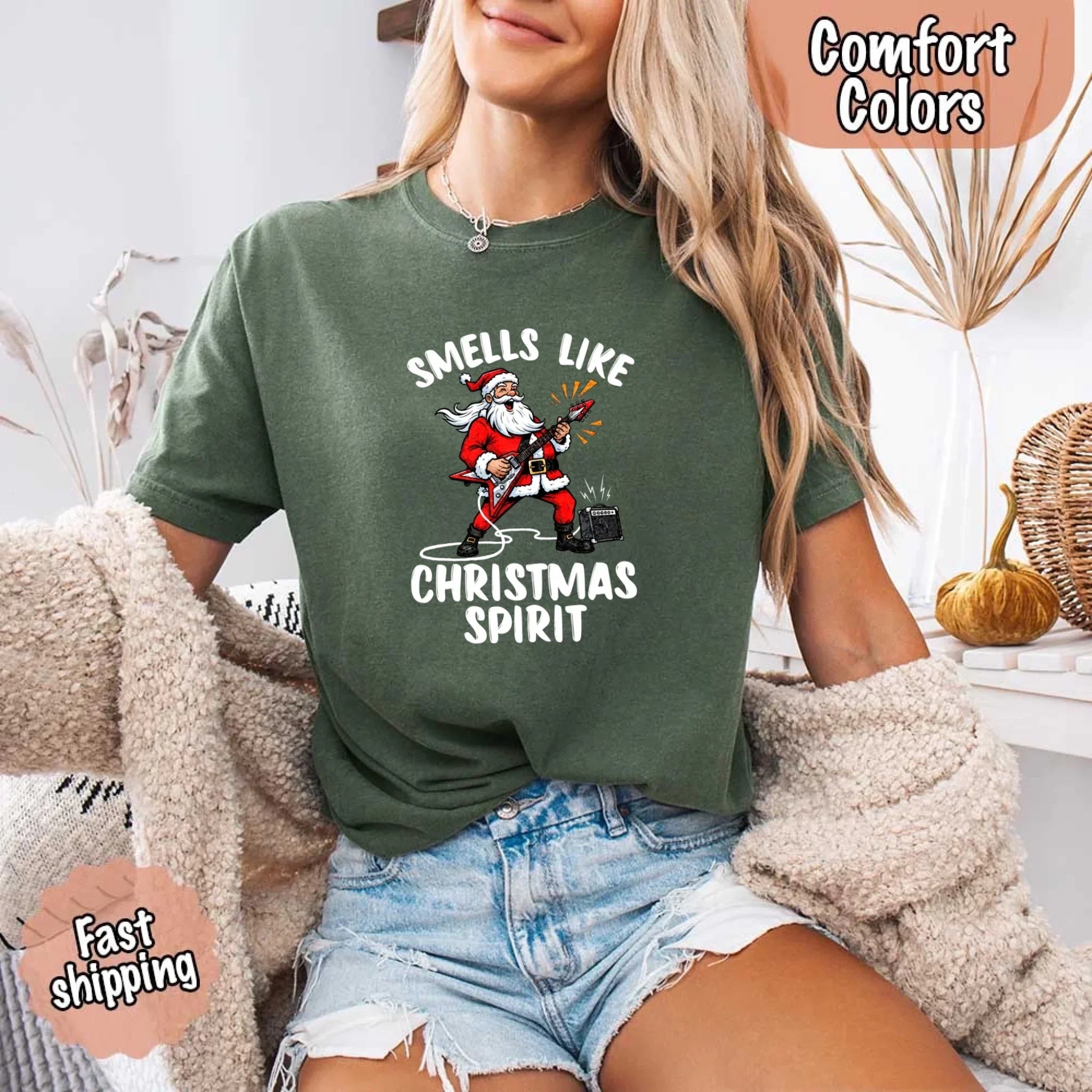 Moss green T-shirt with Santa graphic and 'Smells Like Christmas Spirit' print