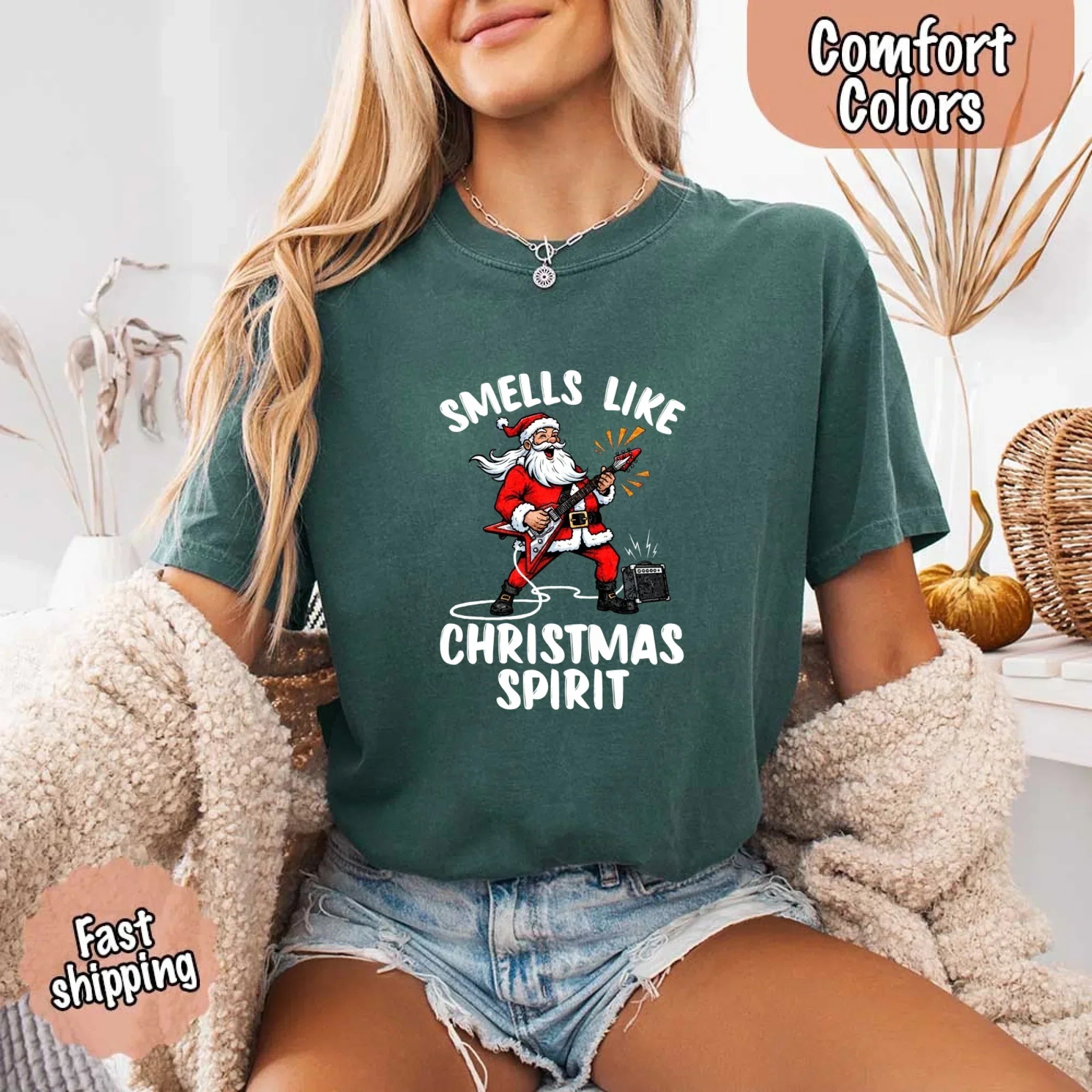 Deep green T-shirt with Santa graphic and 'Smells Like Christmas Spirit' print