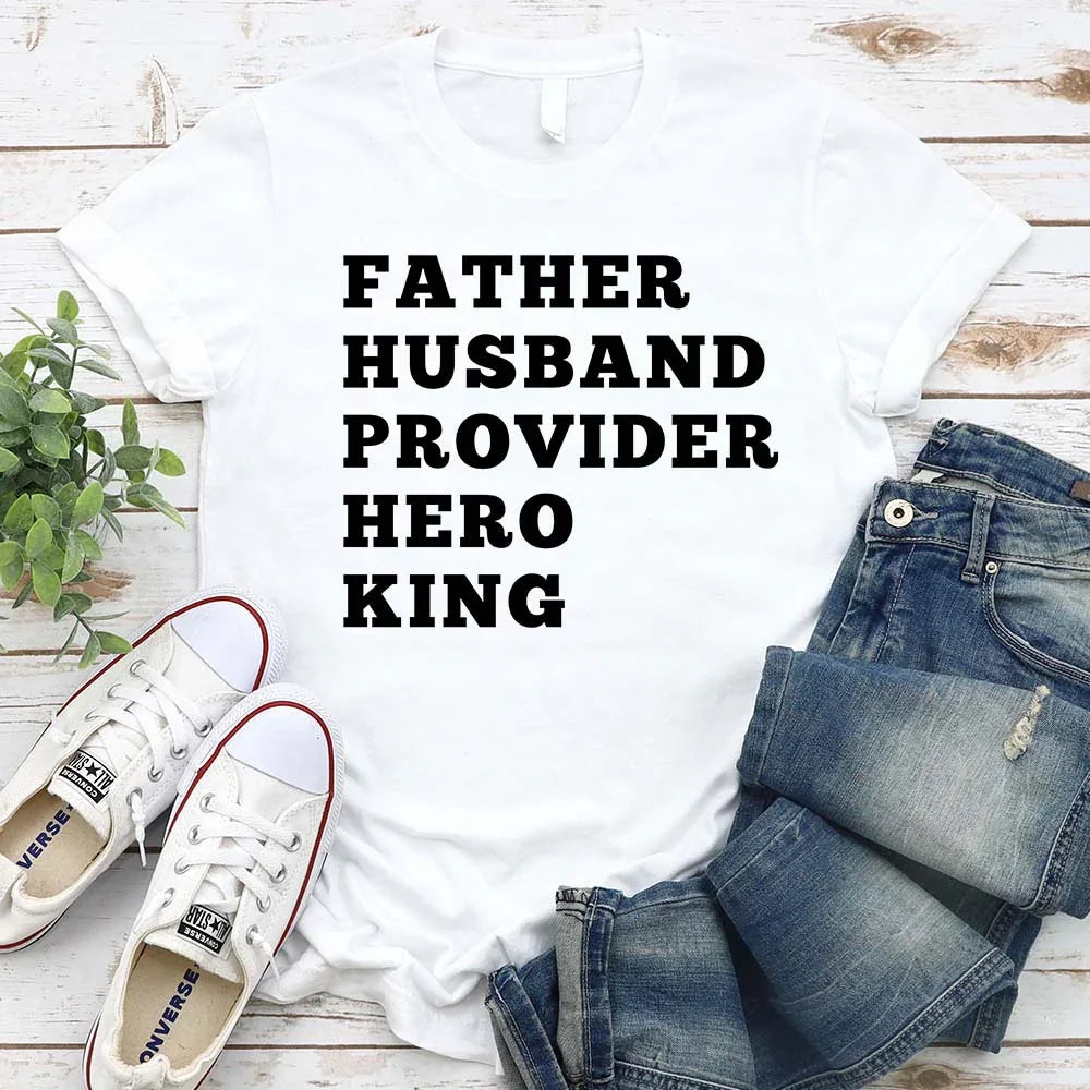 White crewneck T-shirt with stacked "FATHER HUSBAND PROVIDER HERO KING" print