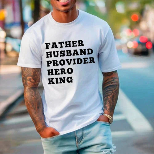 White graphic T-shirt with black stacked text: FATHER HUSBAND PROVIDER HERO KING