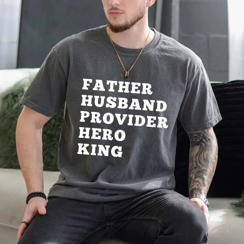 Gray graphic T-shirt with white stacked text: FATHER HUSBAND PROVIDER HERO KING
