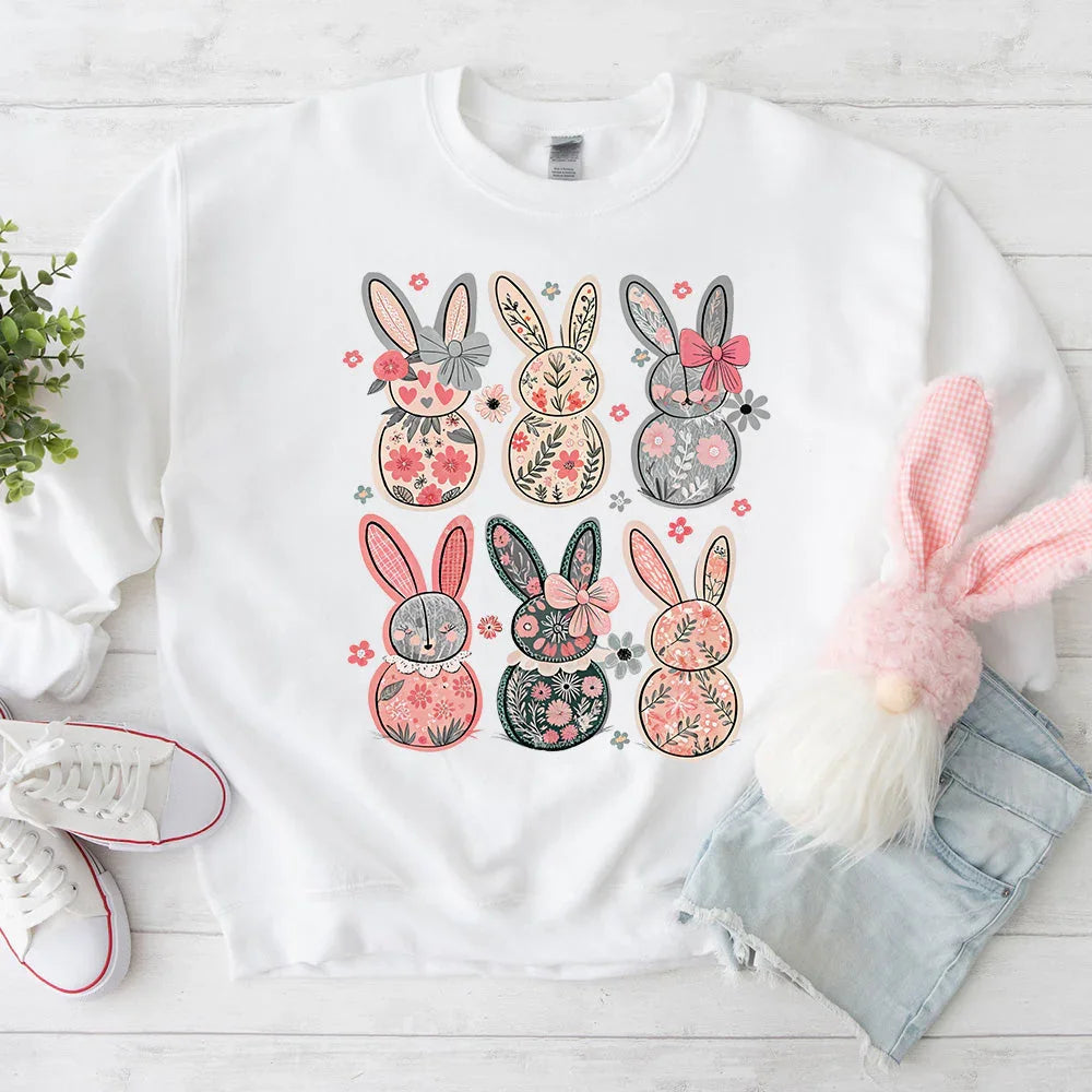 White crewneck sweatshirt with multi-color bunny floral collage