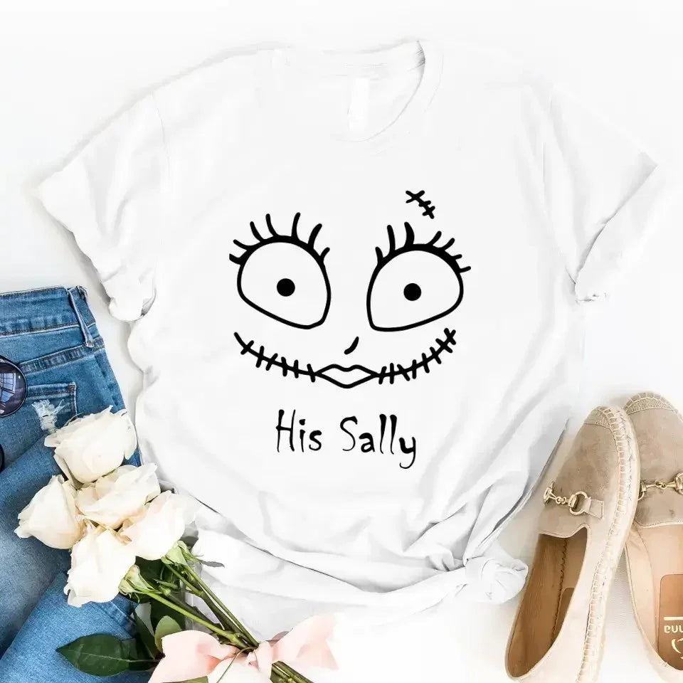 White Halloween couple tee with Sally face eyes graphic and text "His Sally"