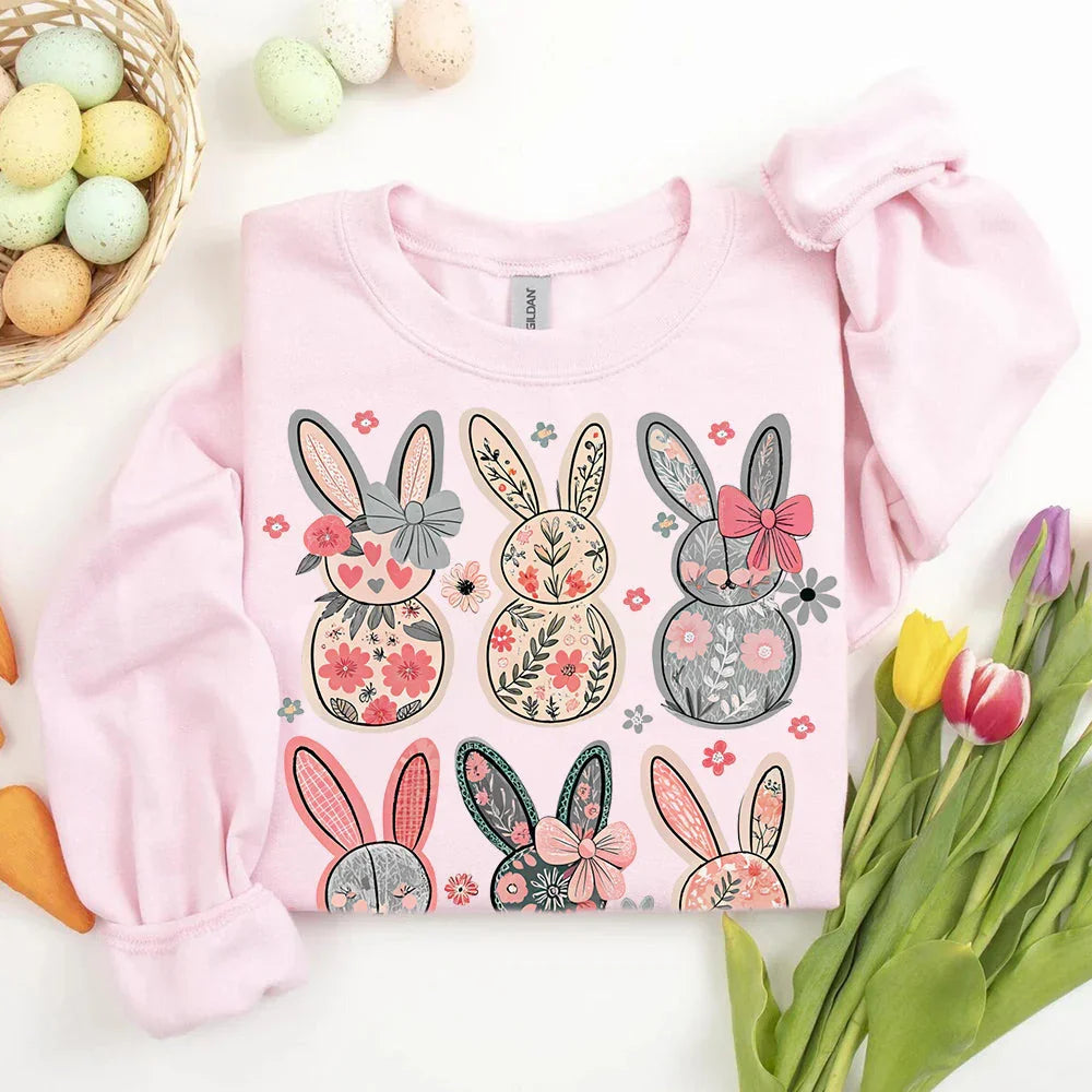 Pink crewneck sweatshirt with colorful bunny floral graphic