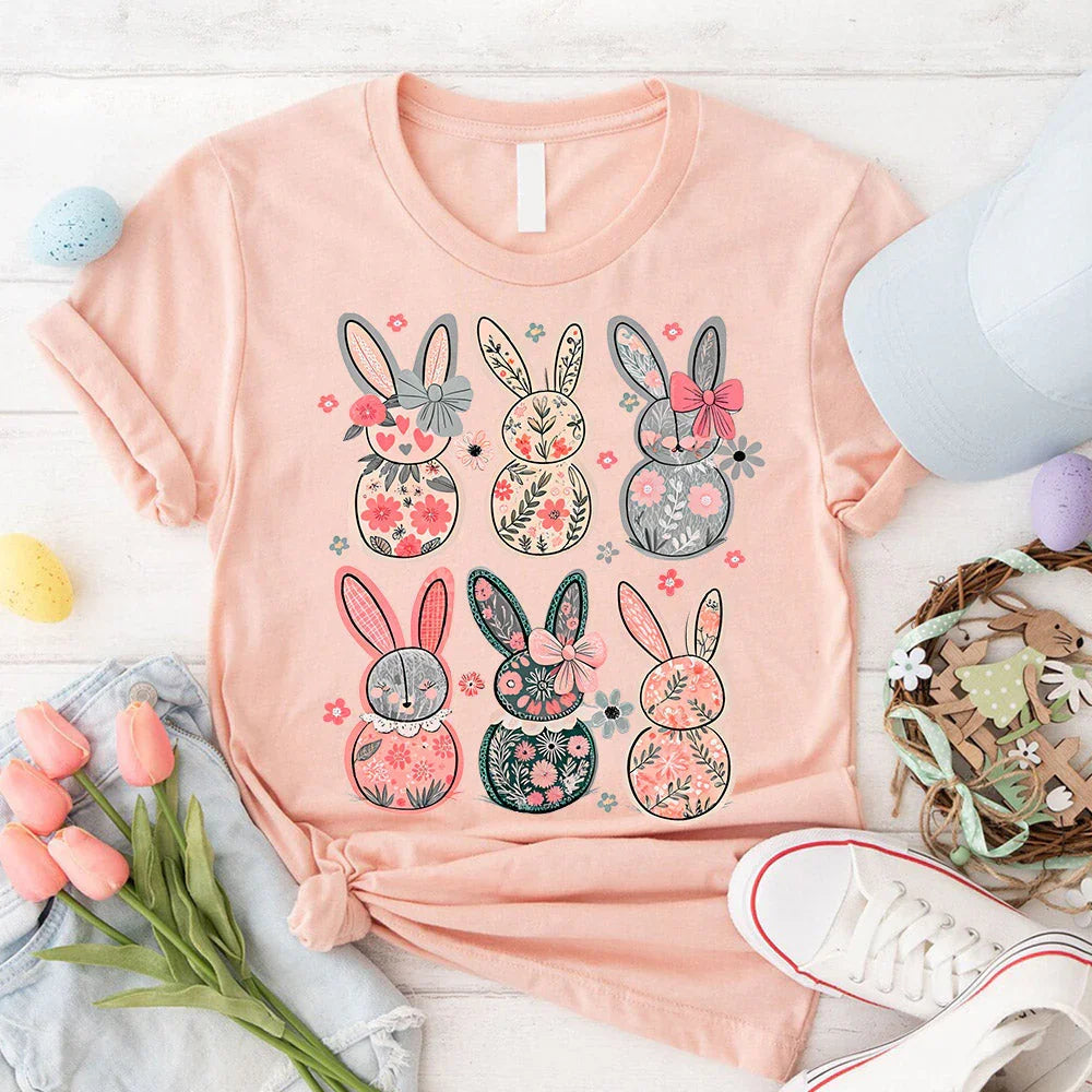 Peach pink bunny floral graphic T-shirt with nine patterned Easter bunnies
