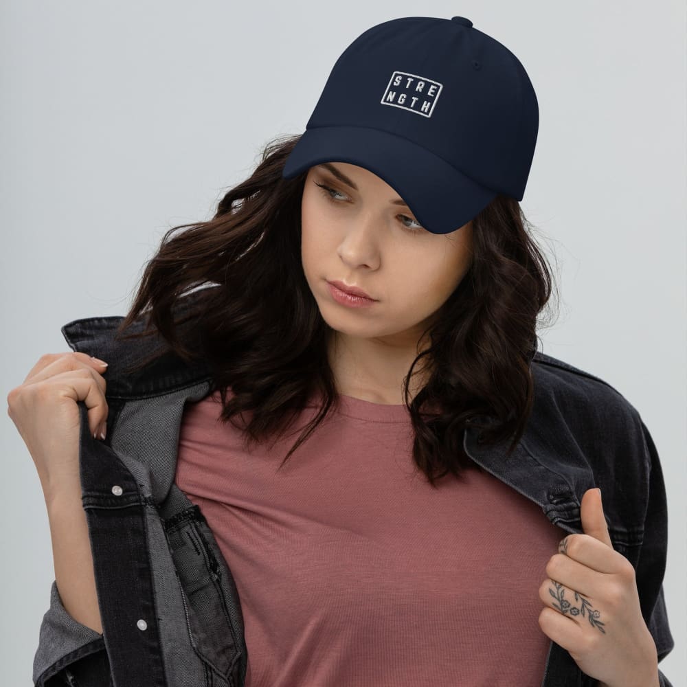 Navy baseball cap with embroidered square logo on front