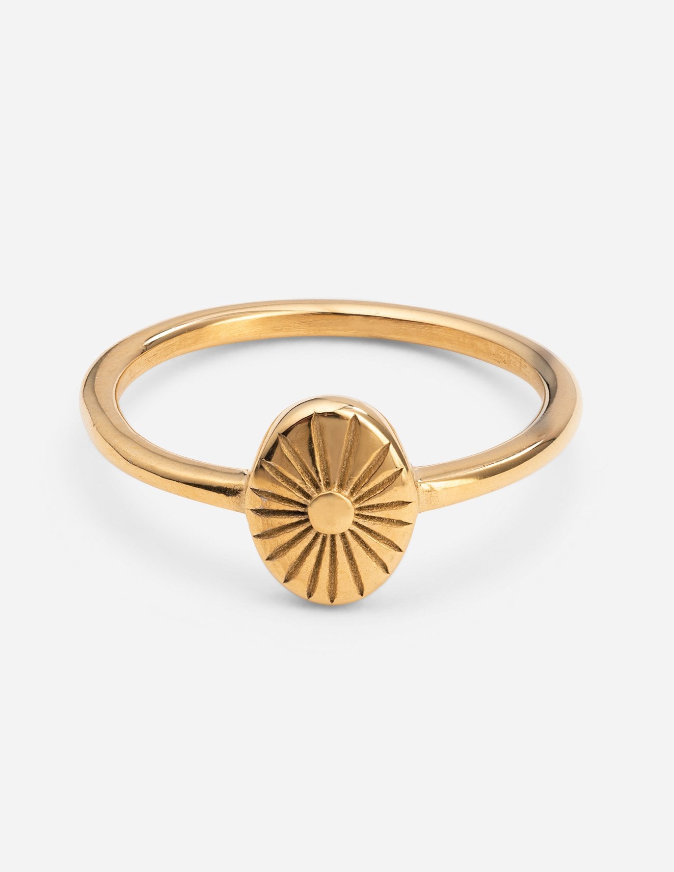 Gold-tone sunburst ring with raised round sunburst design on thin band