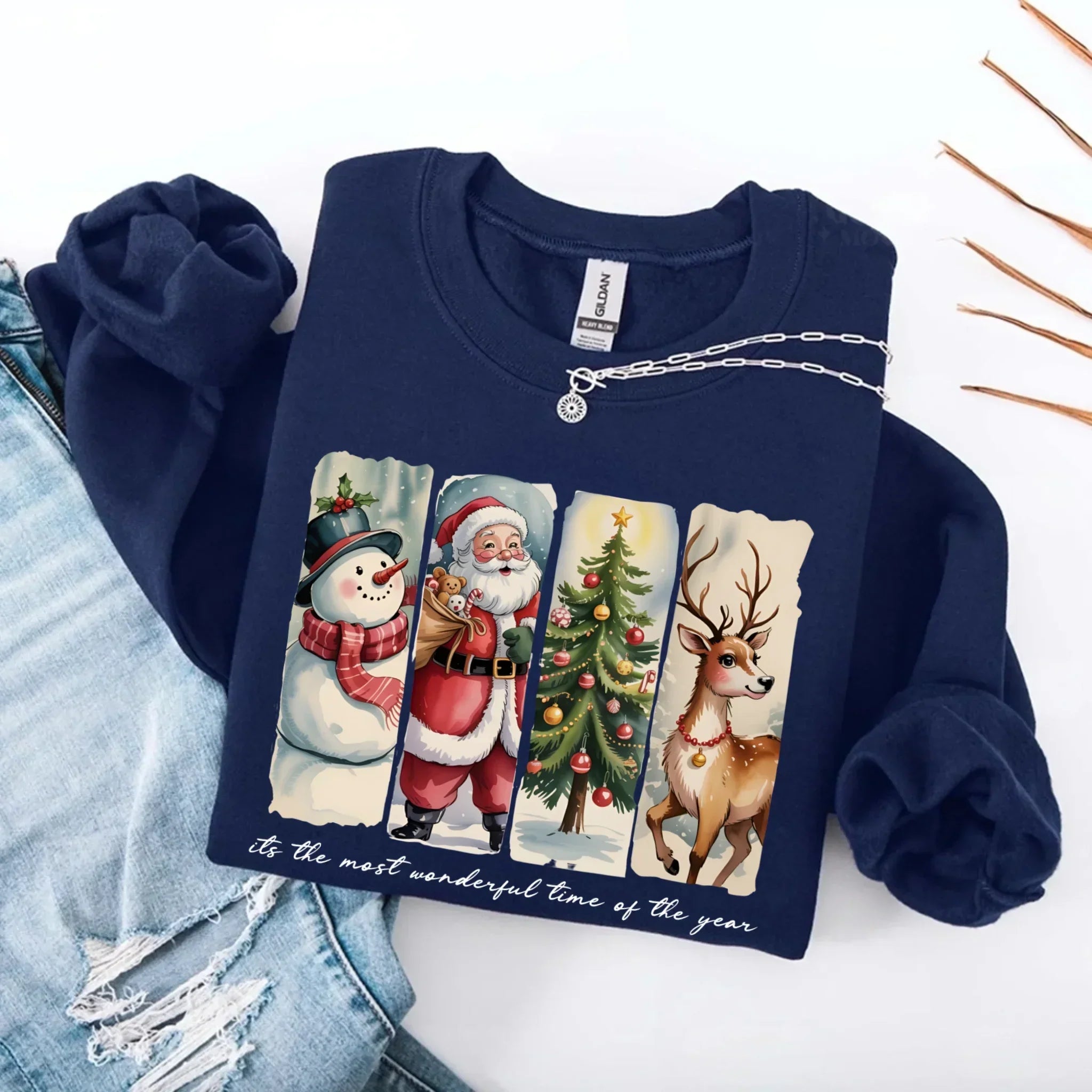 Navy crewneck sweatshirt with Santa, snowman, tree and reindeer graphic