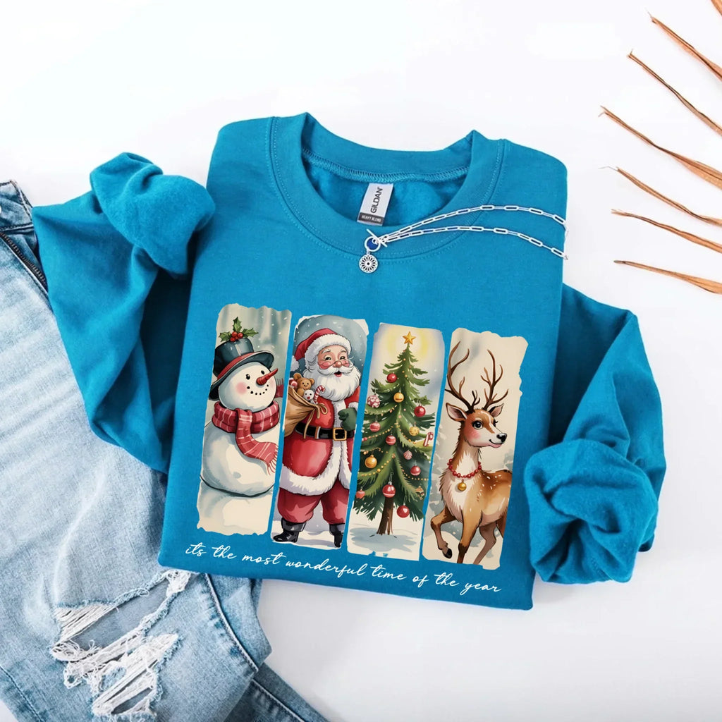 Blue crewneck sweatshirt with Santa, snowman, tree and reindeer graphic