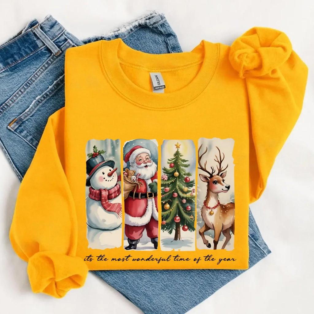 Yellow crewneck sweatshirt with Santa, snowman, and reindeer graphic on front