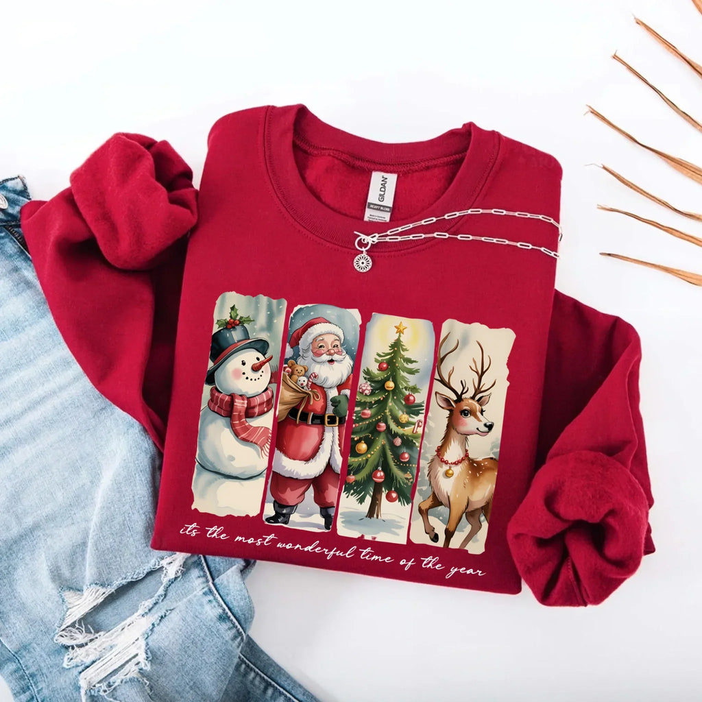 Red crewneck sweatshirt with Santa, snowman, tree and reindeer graphic