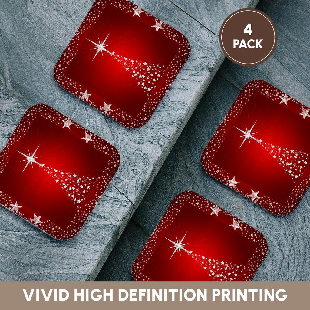 Four red holiday star tree coasters with silver sparkle star accents, on a gray surface