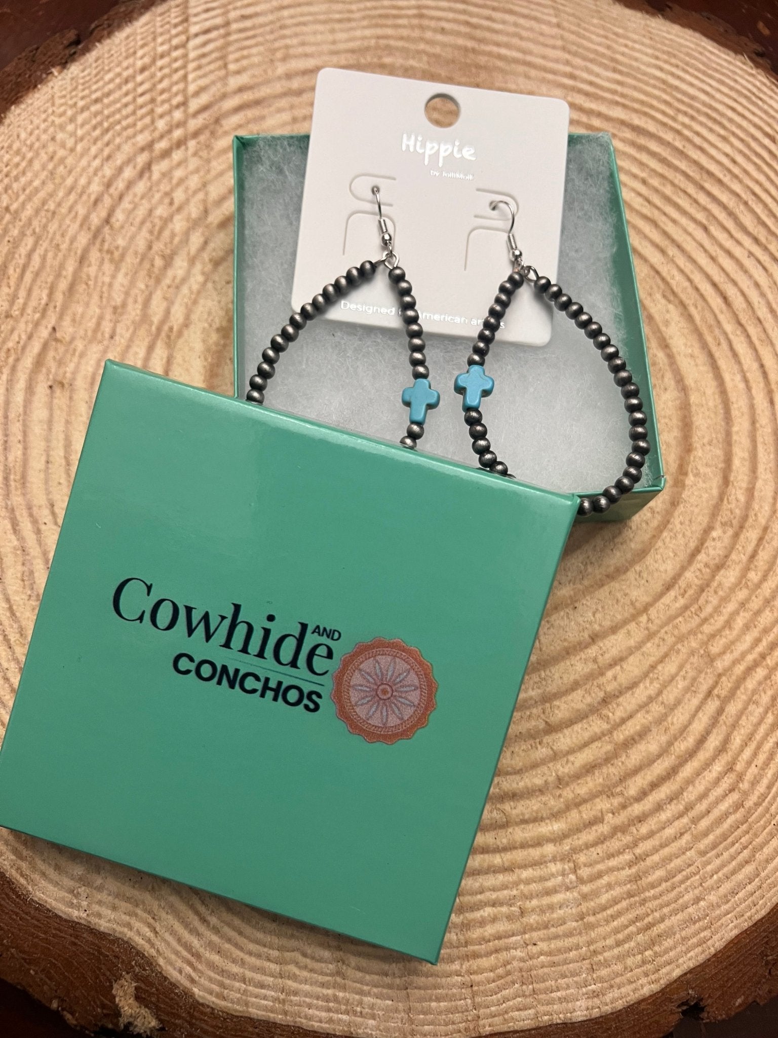 Turquoise cross drop earrings with black bead hoop design
