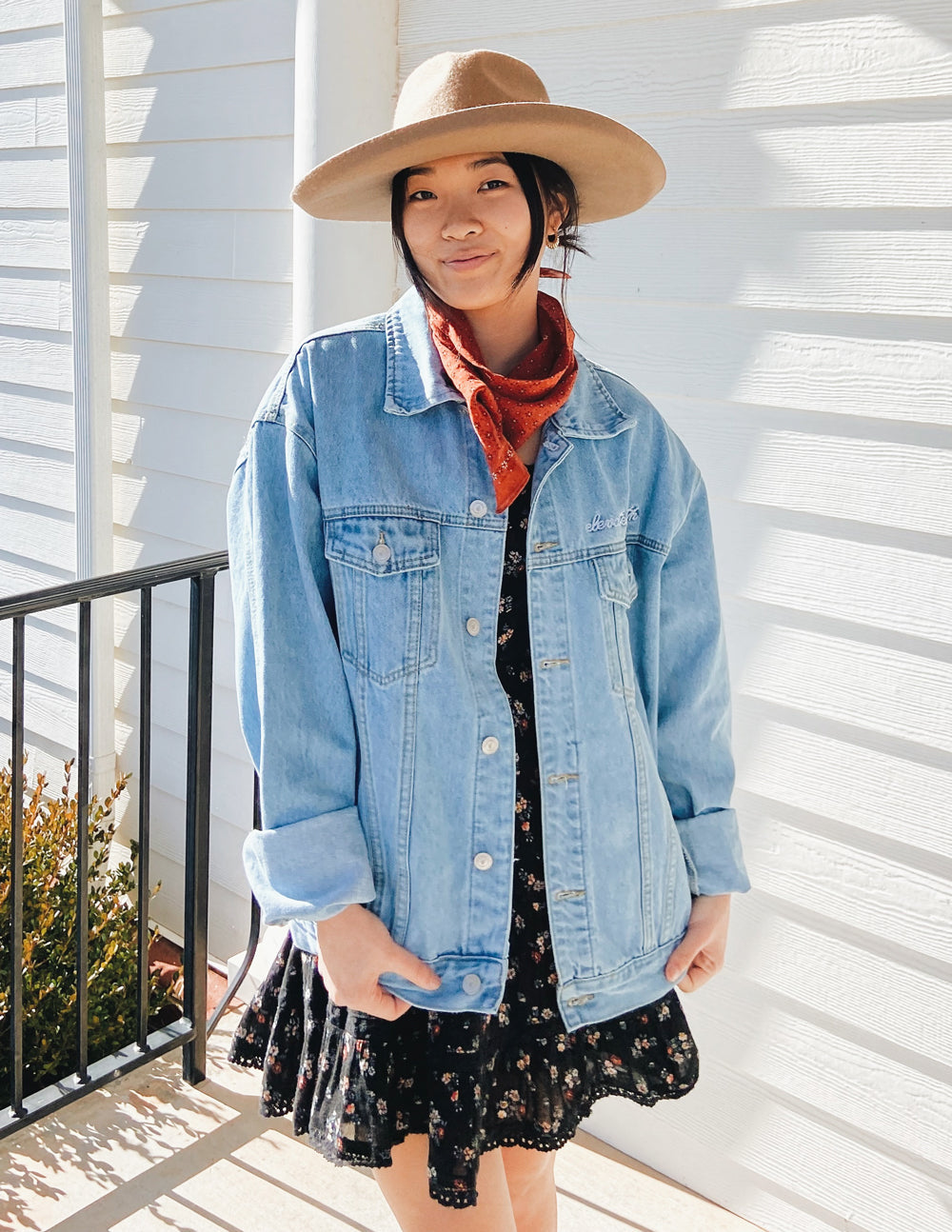Light-wash denim jacket with button front and chest pockets