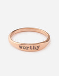 Rose gold ring with "Worthy" engraving on the band
