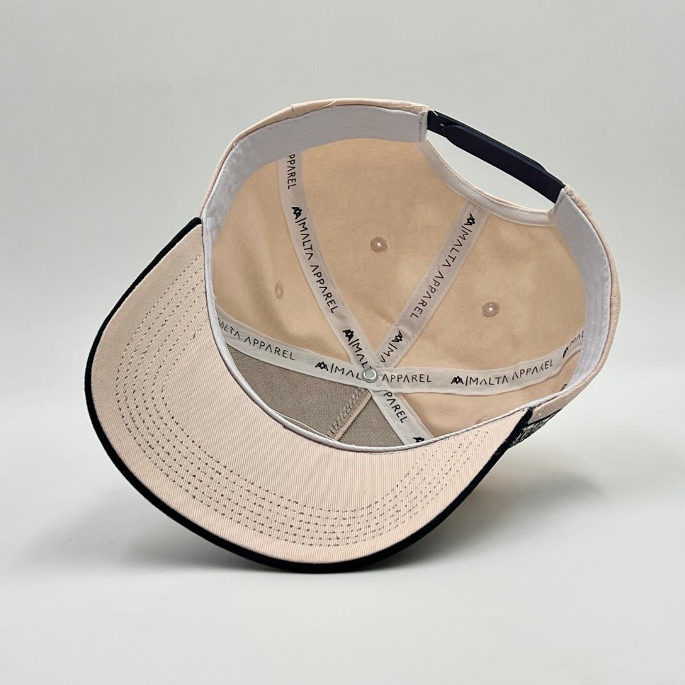Cream snapback cap interior with repeat YAHWEH lining and stitched brim