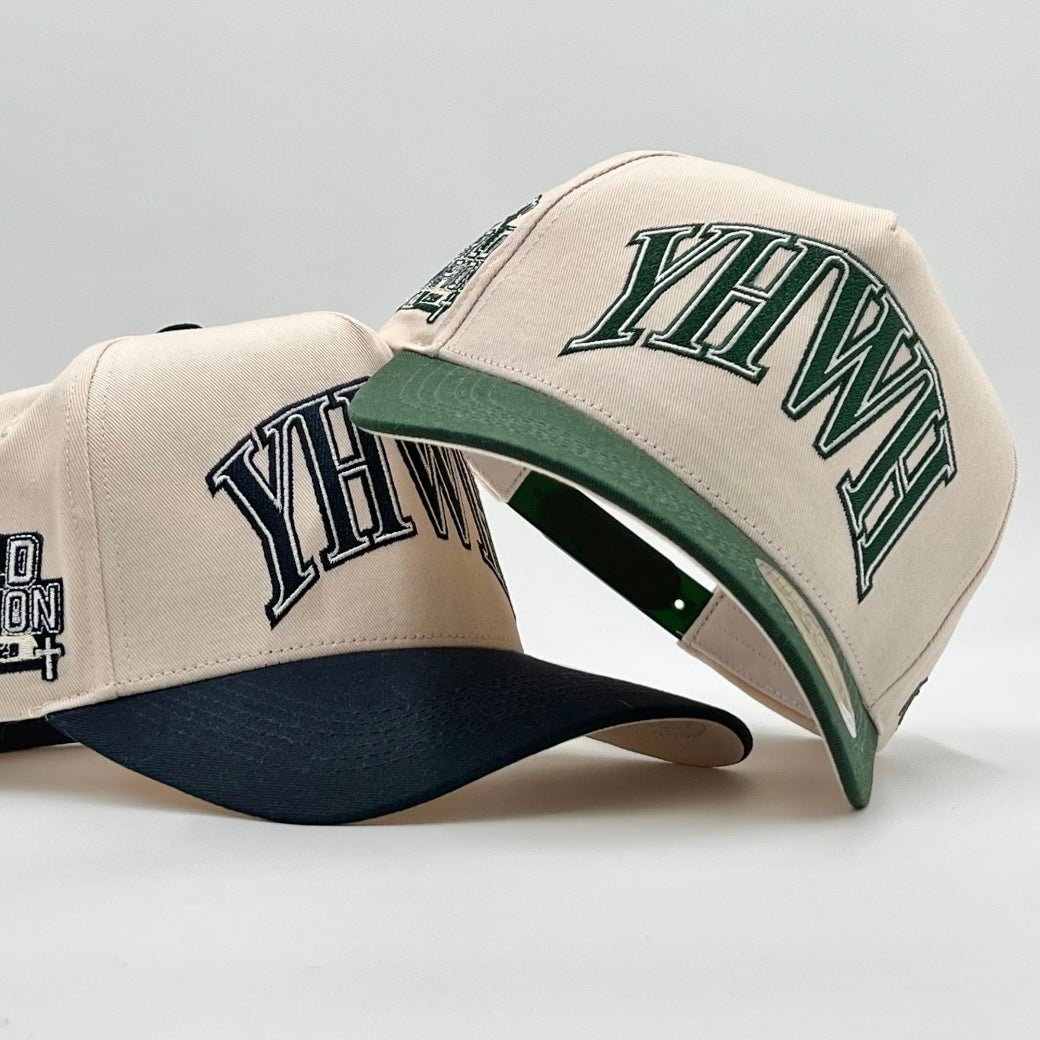 Cream snapback cap with green brim and YHWH logo, side view