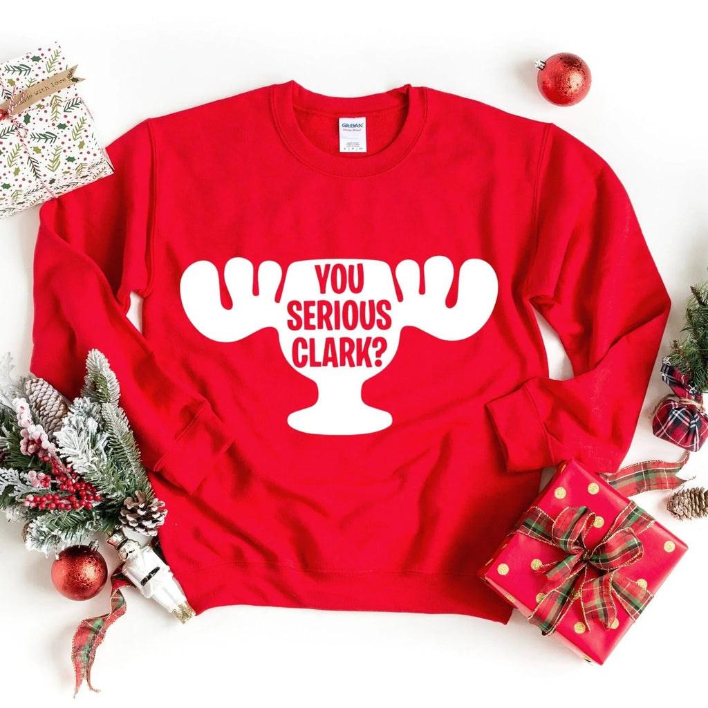 Red crewneck sweatshirt with white 'You Serious Clark?' graphic